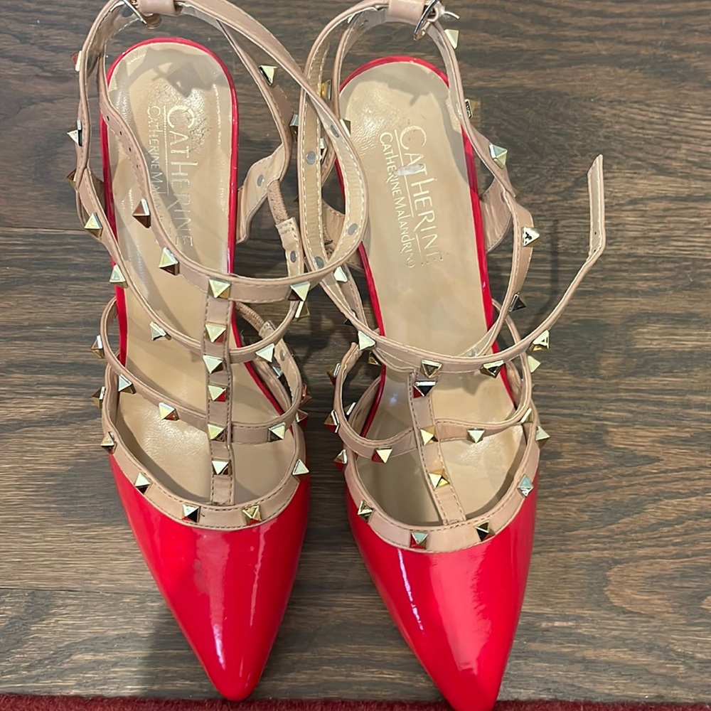 Red and golden studded Catherine Malandrino heels.